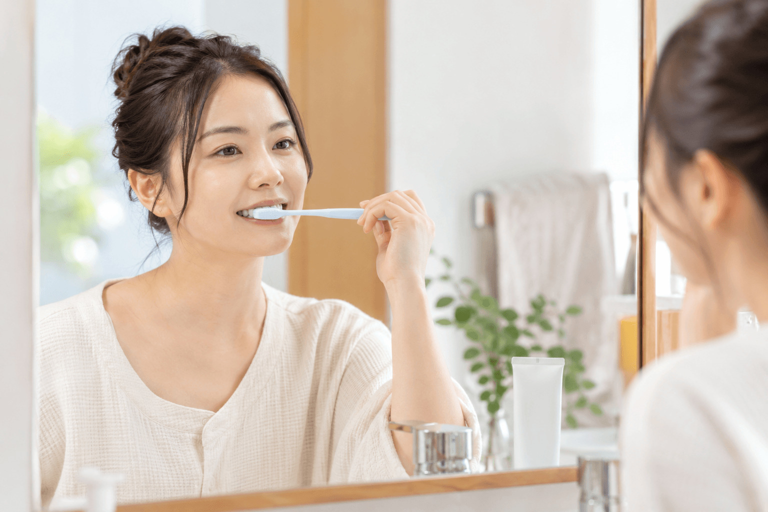 軽い知覚過敏の症状を様子見しているイメージ